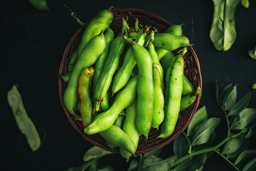 Broad bean. Fresh broad beans with spices. Green beans.