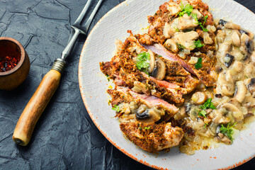 Turkey schnitzel with fried mushrooms