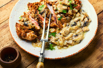 Turkey schnitzel with fried mushrooms