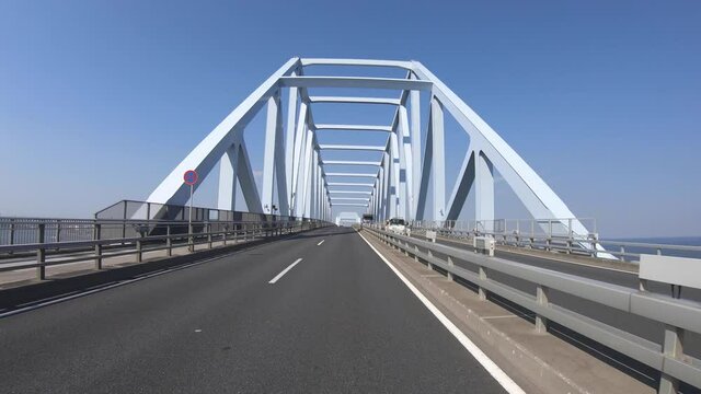 A pov of driving cityscape on the bridge in Tokyo