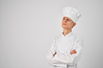 a man in a chef's uniform professional work in a restaurant