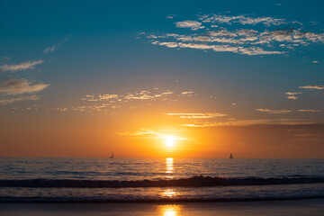 Sunrise over the sea and beautiful cloudscape, hawaii. Colorful ocean beach sunset.