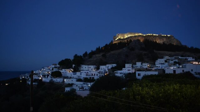Lindos Greece evening with the acropolis and bay