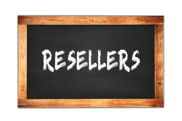 Fototapeta premium RESELLERS text written on wooden frame school blackboard.