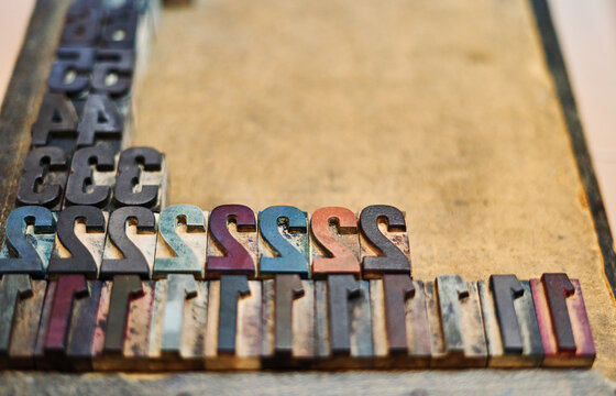 Shabby metal letterpress numbers on tray
