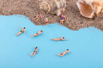 Miniature dolls for swimming and leisure at the beach