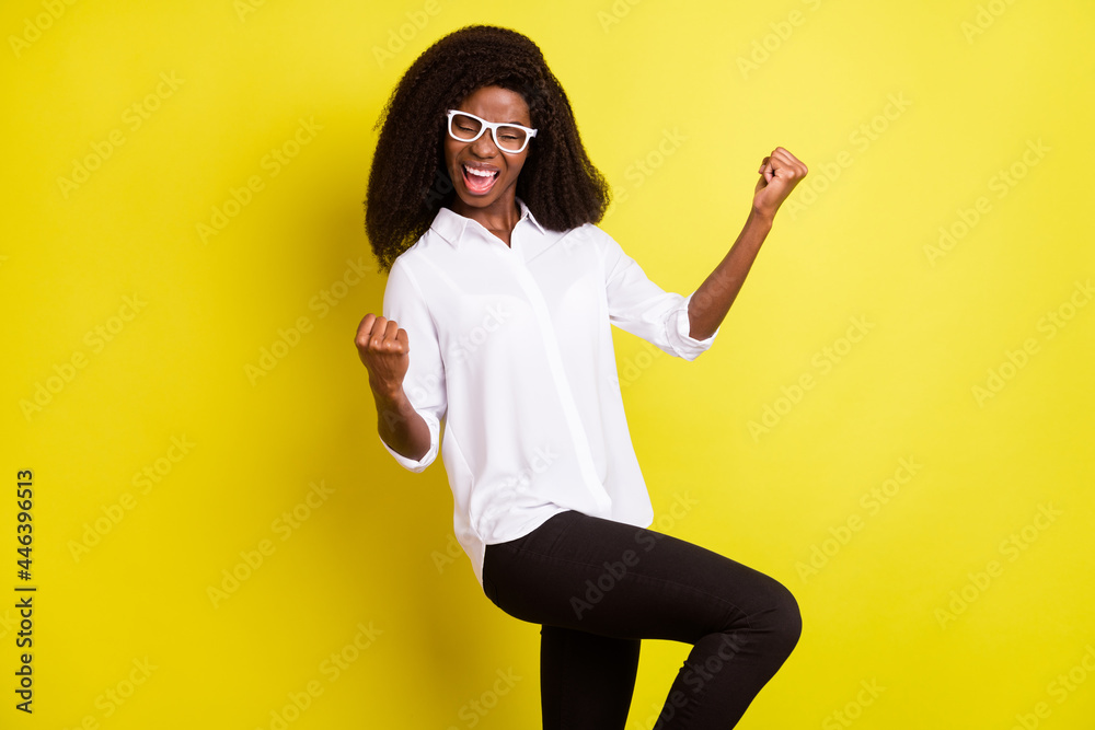 Sticker Photo of hooray young clever lady hands fists wear spectacles white shirt isolated on vivid yellow color background