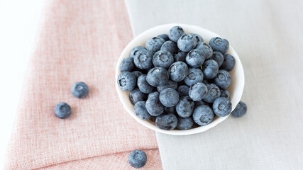 Bowl with blueberries. Close up. Selective focus