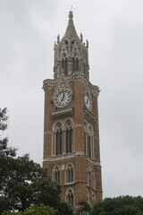 Fototapeta na wymiar clock tower with ancient building Mumbai India