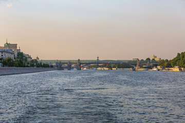 Fototapeta premium Transport bridge over the Moskva River in the russian capital on a summer evening. Moscow, Russia