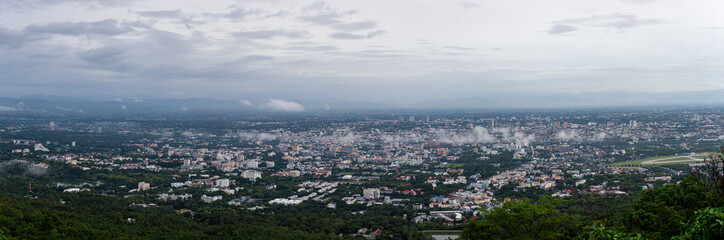 Obraz premium Panorama view of Chiang Mai city scenery Northern Thailand after the rain with fog