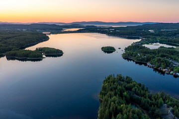 Evening panorama on Karelian lake Kovdozero. Settlement Zelenoborsky, Kandalaksha, Murmansk region,...