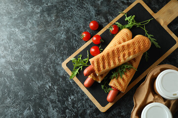Concept of tasty food with french hot dog