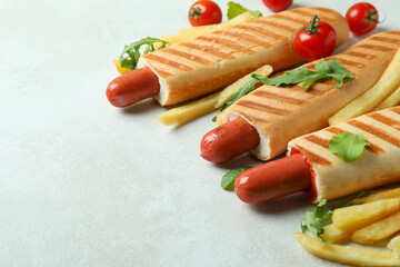 Concept of tasty food with french hot dog