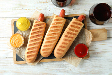 Concept of tasty food with french hot dog