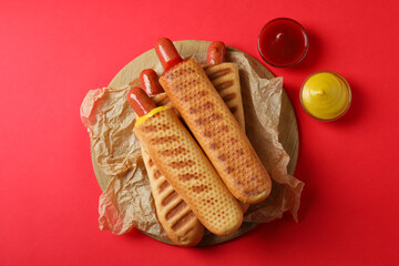 Concept of tasty food with french hot dog