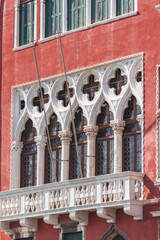 Close up details of windows on facade of Palazzo Erizzo, also known as Palazzo Erizzo alla Maddalena on the Grand Canal, Cannaregio, Venice, Italy