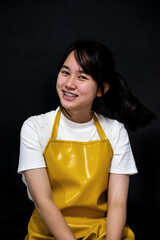 Portrait of teen girl smiling looking at camera over background.