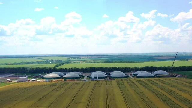 Tanks in biogas plant. Aerial view of biogas plant and storage tanks