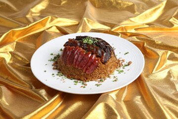 steamed sticky glutinous fried rice with mixed waxed meats chinese sausage wrapped in lotus leaf on gold asian menu