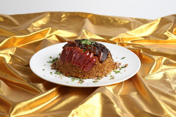 steamed sticky glutinous fried rice with mixed waxed meats chinese sausage wrapped in lotus leaf on gold asian menu