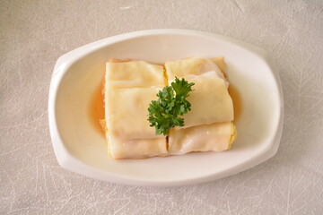steamed rice vermicelli noodle roll wrapped with char siew prawn meat in salted soy sauce Cee cheong fan asian halal dim sum menu