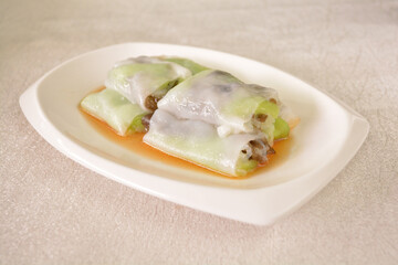 steamed rice vermicelli noodle roll wrapped with char siew prawn meat in salted soy sauce Cee cheong fan asian halal dim sum menu
