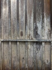 Old rusty metal warehouse wall. Architectural details background