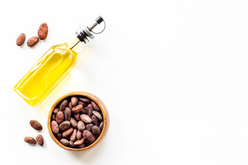 Cacoa essential oil with cacoa beans. Cacoa butter cosmetic and healthcare products ingredient