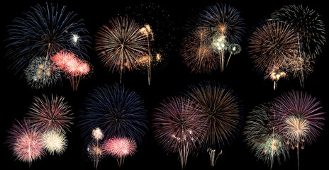 Fototapeta premium Beautiful colorful of different fireworks on black background at festival to celebrate,abstract pattern design of set fireworks for display,season of festivity,highlight of national event celebration