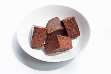 Chicken blood tofu in white plate on white