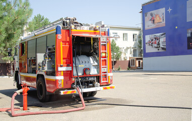 .The fire truck is fueled with water. City post of the Ministry of Emergency Situations.