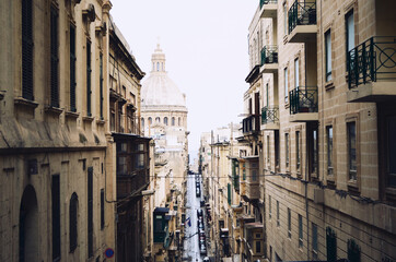 Fototapeta na wymiar MALTA, VALETTA: Scenic cityscape view of the streets with old buildings 