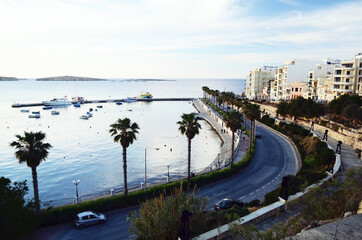 MALTA, VALETTA: Scenic cityscape view of the bay with boats
