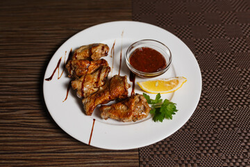 grilled chicken wings with sauce