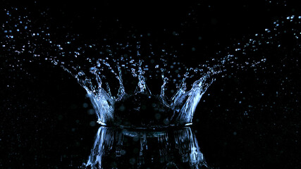 Freeze motion of water splash on black background.