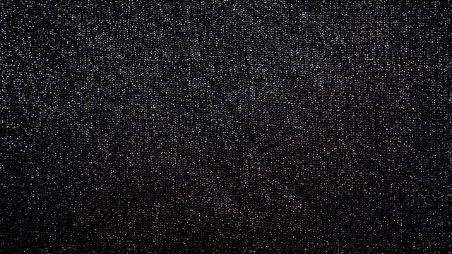 Abstract blinking background black fabric. Fabric texture with spangles