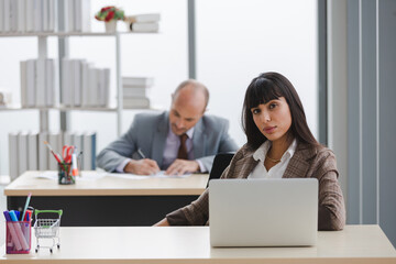 Lifestyles professionals business people working in workspace. Young businesswoman working on laptop computer. Executive businessman working in office