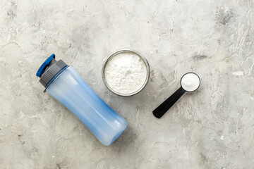 Sport nutrition - whey protein powder and shaker with protein smoothie