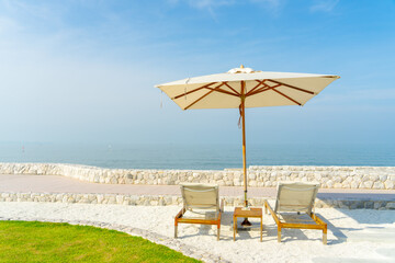 Beach chair and umbrella with nice blue sky
