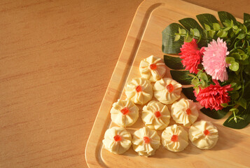 A Malay traditional cookies called as Biskut Bunga Cina or Chinese Flower Cookies served during Eid Fitri.