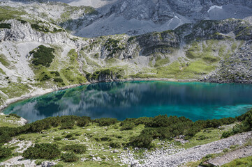 Fototapeta na wymiar view of Drachensee lake and mountains around it