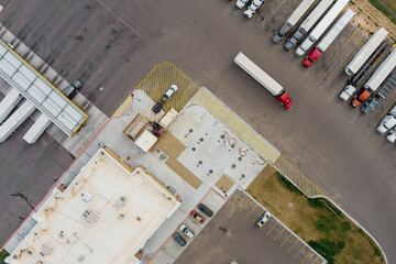 Top view car parking truck stop on rest area on the highway at fueling station