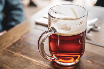 Pint of english ale beer on a table