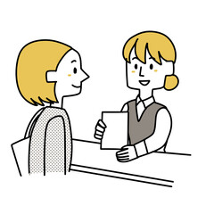 用紙を渡す受付の女性