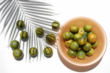 Orange with shadow of tree