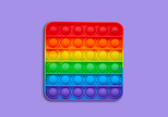 Silicone toy antistress popit. New trend. Colorful anti stress sensory toy fidget push pop it . Flat lay with copyspace.