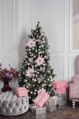 Christmas tree and white and pink decor.