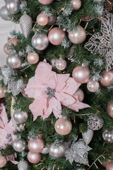 Christmas tree and white and pink decor.