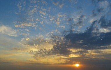 Beautiful colorful sunset in blue sky, natural background 